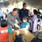 Wakil Menteri Koordinator Bidang Pangan Hanif Faisol saat meninjau peternakan sapi perah di Cisarua, Puncak Bogor, Minggu (7/6/2026)